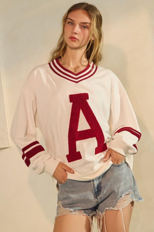 A Varsity Pullover in White and Crimson